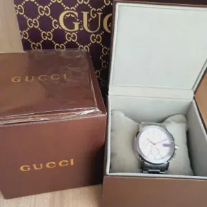 Gucci Men’s Analog Quartz Display Swiss Made Stainless Steel Silver Watch YA101201