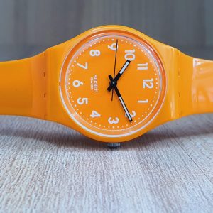 Swatch Women's/Girl's Swiss Made Quartz Orange Dial 30mm Watch GO105