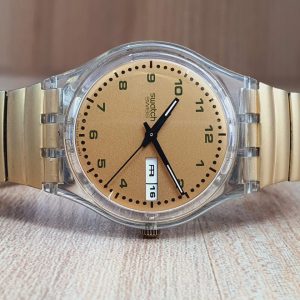 Swatch Men’s Swiss Made Gold Dial Watch GK729