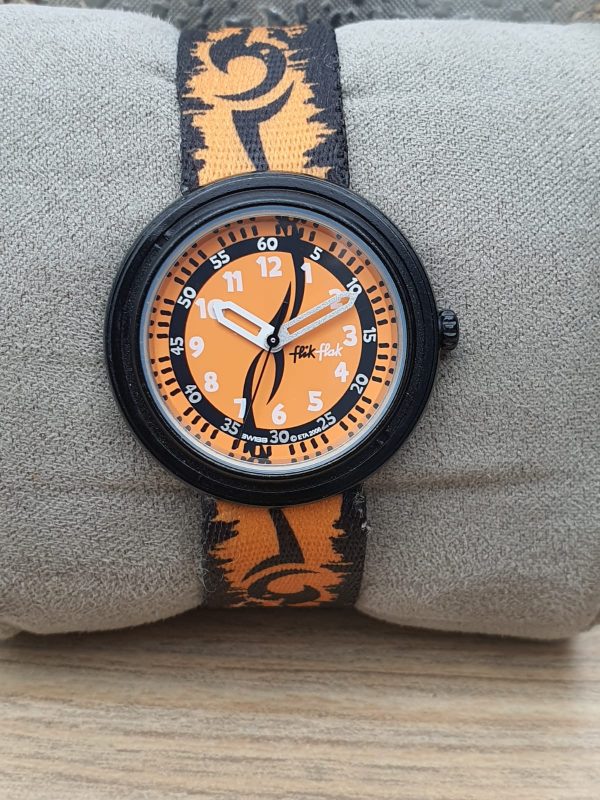 Flik Flak by SWATCH Kid’s Swiss Made Quartz Nylone Strap Orange Dial 32mm Watch ETA0685