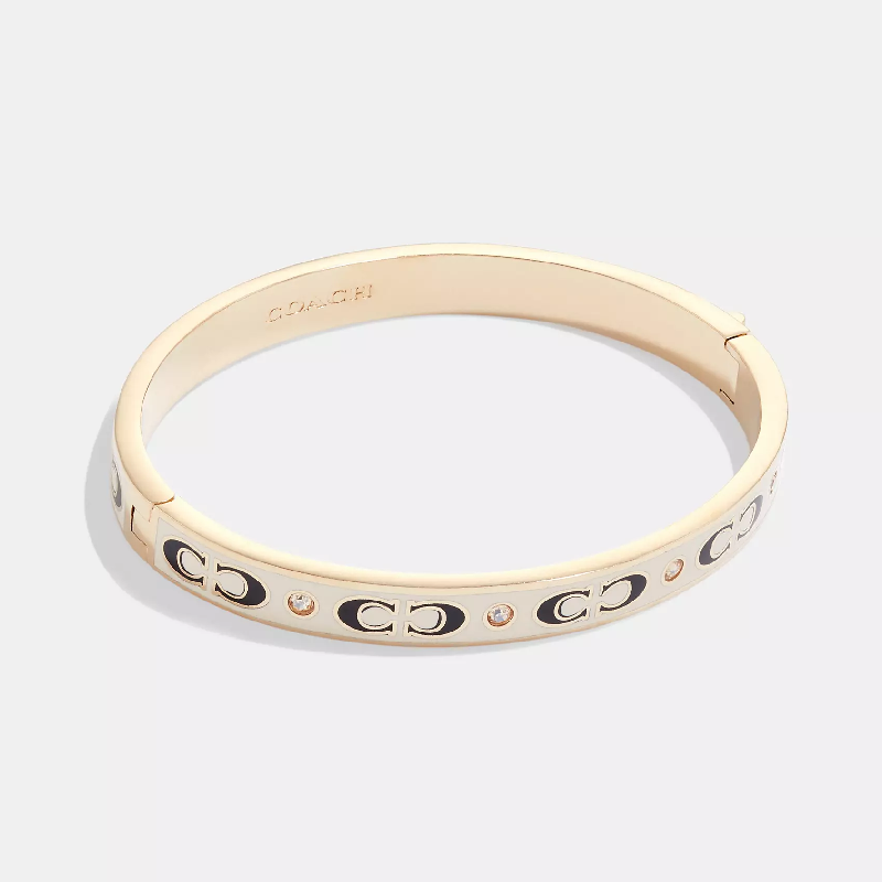 Coach Women’s Signature Enamel Hinged Bangle Gold Tone White Logo Bracelet CI904